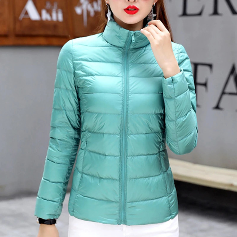 Ultra thin and lightweight womens jacket autumn and winter ultra-thin short sleeved stand up collar warm white duck down jacket womens jacket 240913