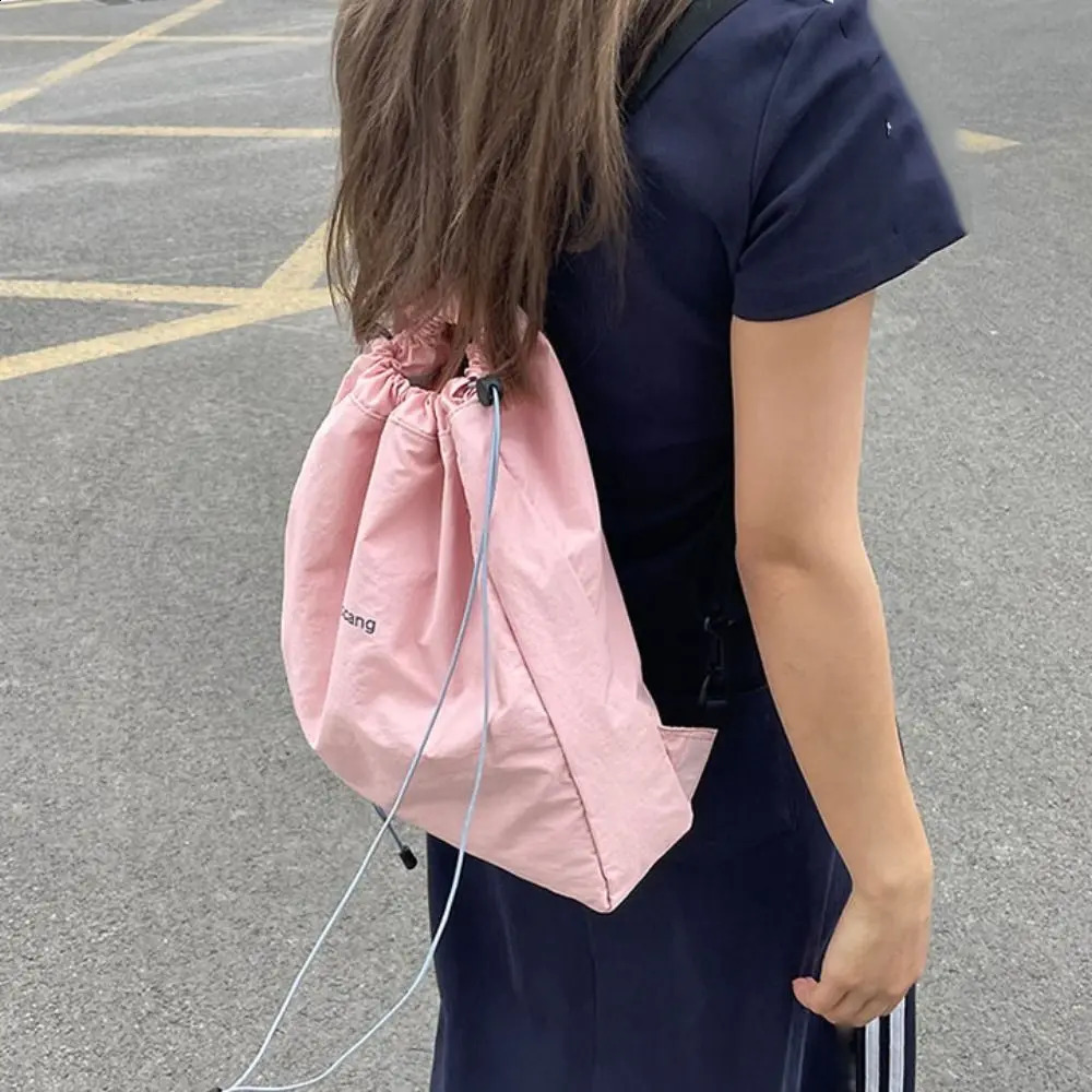 Breathable solid color drawstring backpack Korean canvas nylon backpack large capacity school backpack shoulder bag travel bag 240912