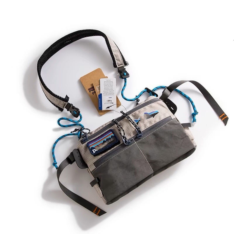 Designer 2025 new Bata men and women sports envelope casual versatile workwear style mobile phone small shoulder bag trend