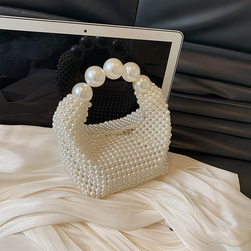 French hand woven pearl hand-held chain women's shoulder 2024 spring/summer new crossbody bag