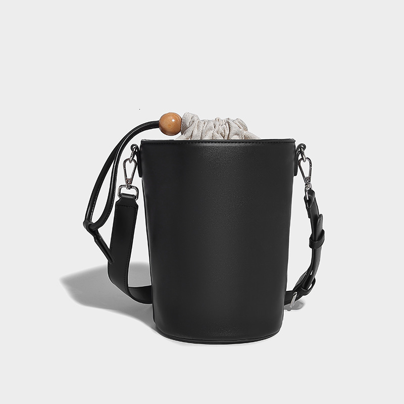 New Solid Color Drawstring Mini Bucket for Women 2024 Commuter Cylinder Texture Single Shoulder Handheld Crossbody Bag