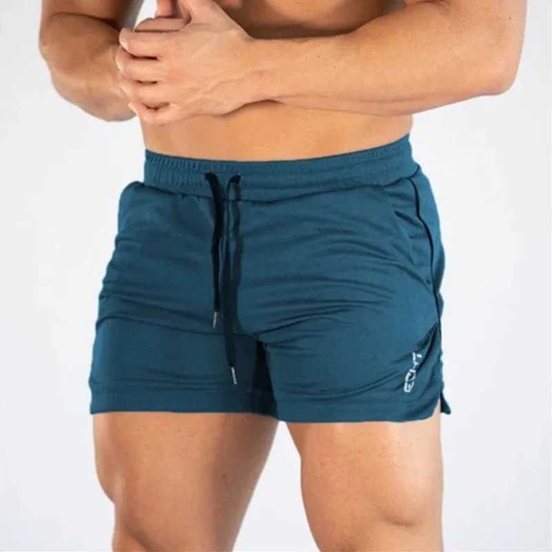 2024 NEW Fitness sports Shorts Man Summer Gyms Workout Male Breathable Mesh shorts Quick Dry Beach Short Pants men Sportswear Y240914