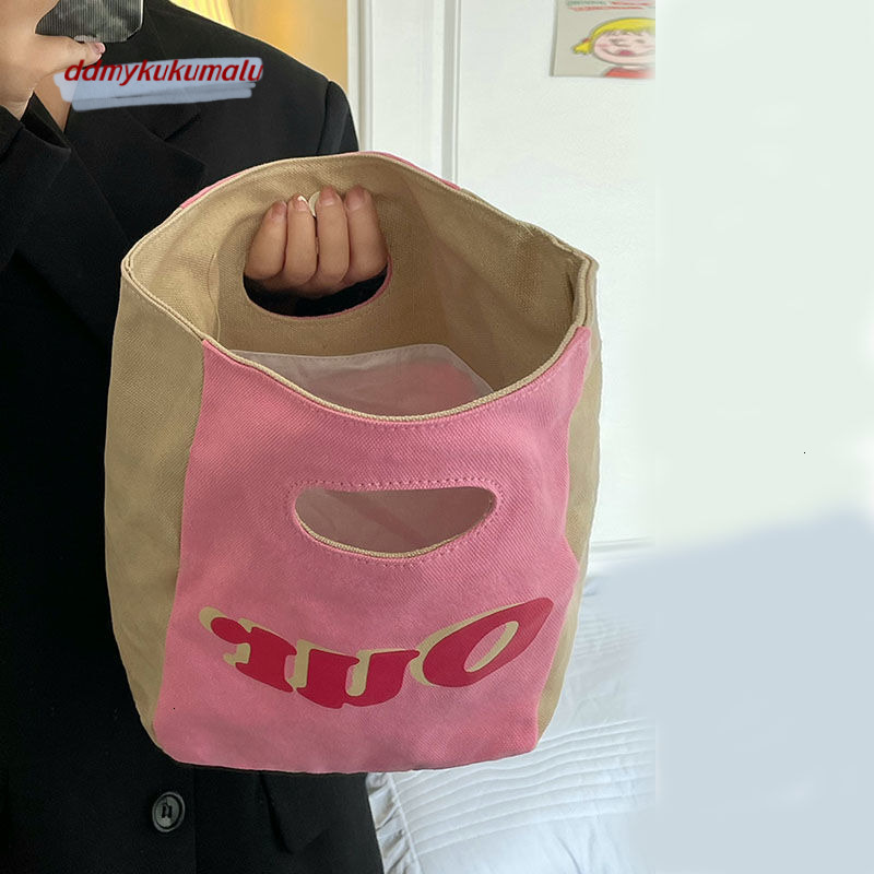 Small niche design, cute handbag, tote casual commuting lunch box makeup storage bag, women's bag H7.19#8 ddmykukumalu