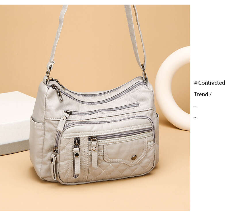 AMZZ trendy seasonal soft leather compartments and pockets, sewn with multiple layers, single shoulder crossbody bag, women's bag