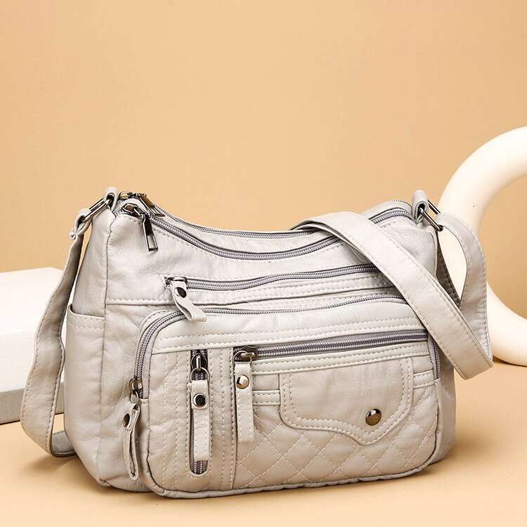 AMZZ trendy seasonal soft leather compartments and pockets, sewn with multiple layers, single shoulder crossbody bag, women's bag
