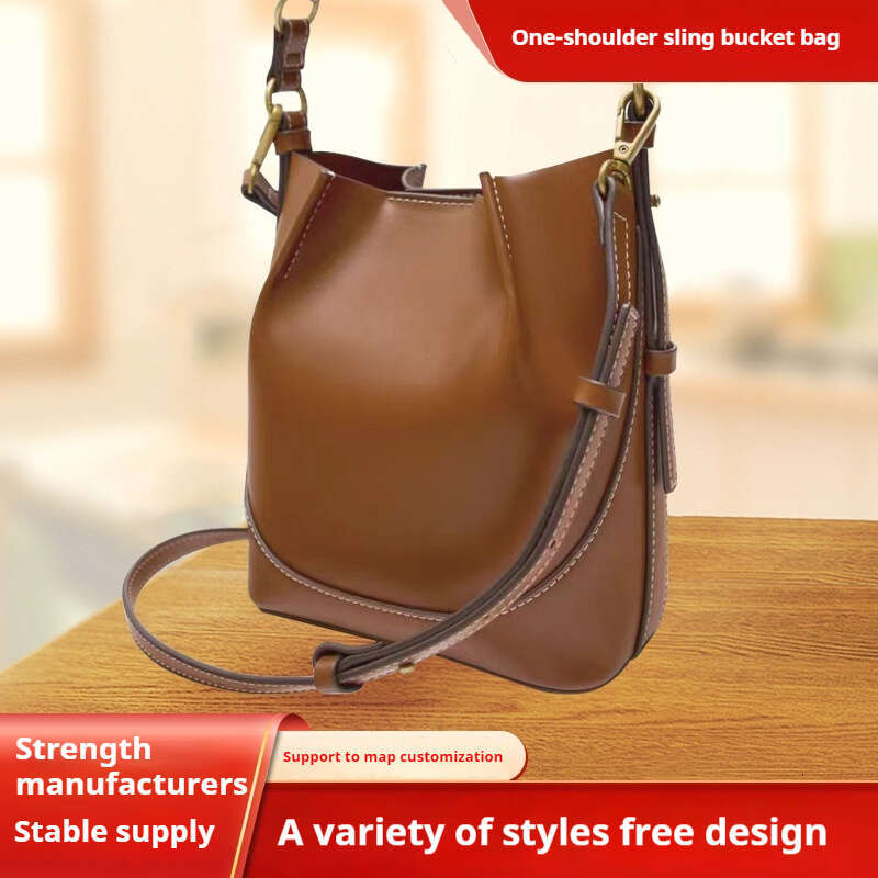 AMZZ Spanish Women's 2024 New Product Fashionable Brown Korean Edition Handheld Crossbody Wide Shoulder Strap Water Bucket Bag for Women