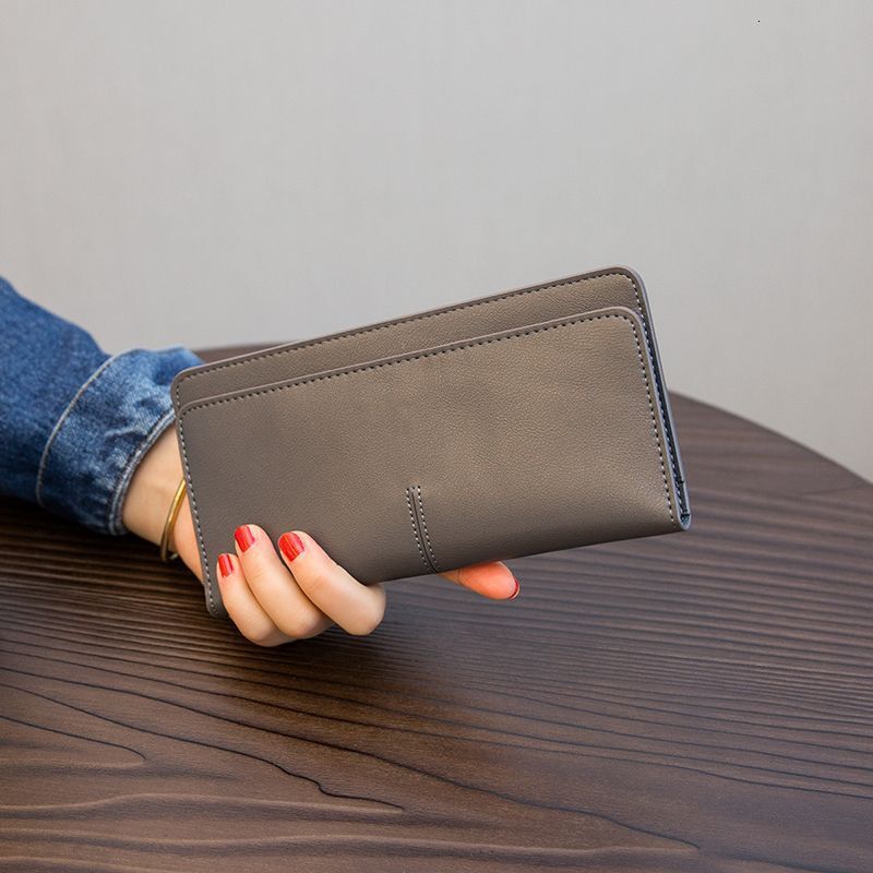 Ins minimalist ultra-thin long women's PU 2024 new style temperament buckle multi card soft leather wallet