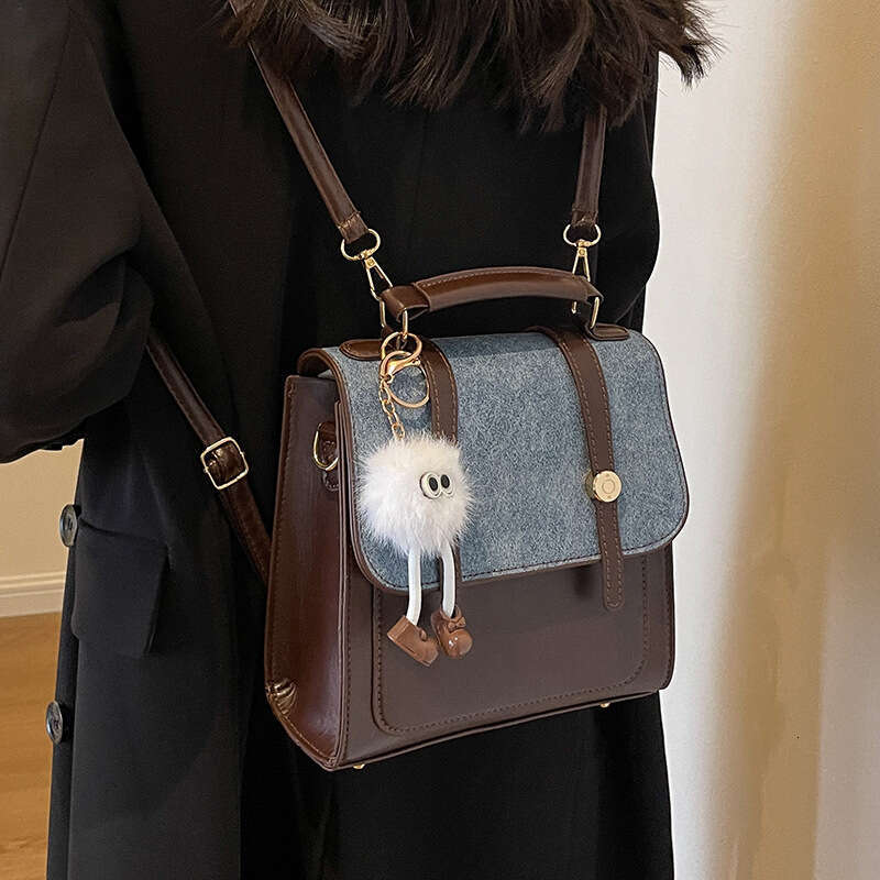 AMZZ Backpack for women in autumn and winter 2023, single shoulder crossbody bag, niche texture handbag, student multifunctional backpack
