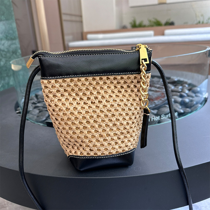 2024 new handmade woven Lafite grass with cowhide for women, large capacity water bucket bag, single shoulder crossbody bag