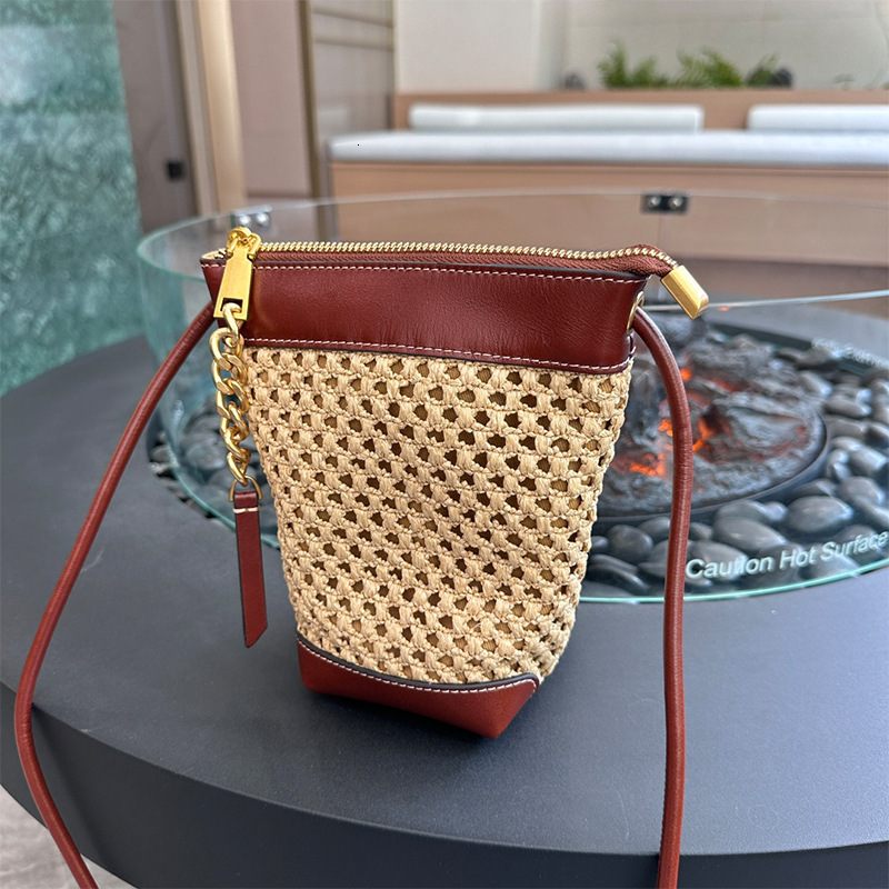 2024 new handmade woven Lafite grass with cowhide for women, large capacity water bucket bag, single shoulder crossbody bag