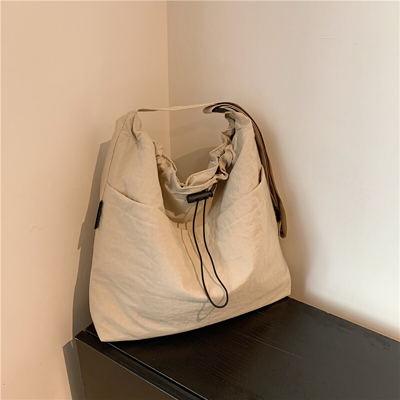 2025 Women's Leisure Personalized Design Shoulder Bag New Fashionable Fabric Single Shoulder Large Capacity Handbag Class Commuter Crossbody Bag 