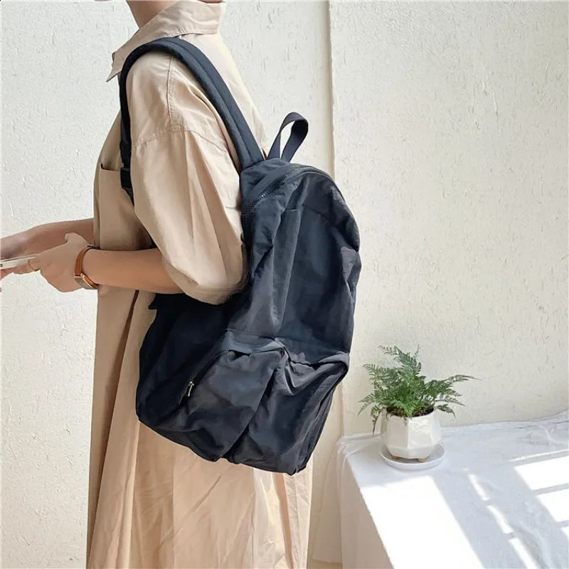 Korean bag casual backpack womens fashionable and simple student bag school bag large capacity nylon backpack womens bag 240912