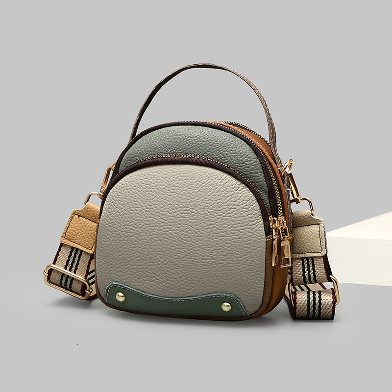 Cowhide Small Round 2025 Summer New Designer Bag Fashionable And Casual Cross Shoulder Contrasting Color Women's Handheld Broadband Bag Women