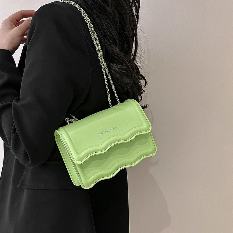 2025 New Women's Casual Shoulder Bag With Fashionable Underarm Design And Wave Chain Shoulders Paired With Simple Material Crossbody Bag And Smal