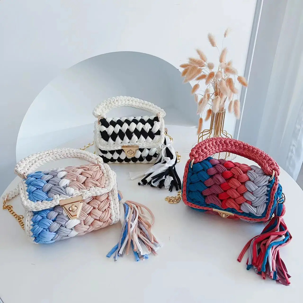 Fashion colored crochet womens handbag with tassel and thick rope shoulder cross body bag knitted small flip cover wallet 240913