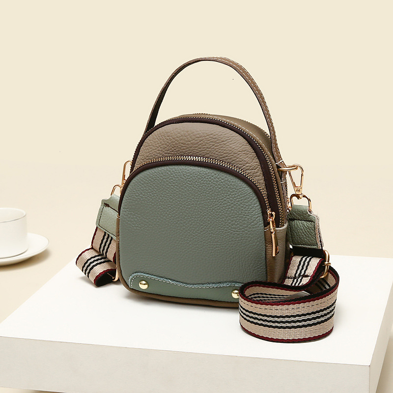 Cowhide Small Round 2025 Summer New Designer Bag Fashionable And Casual Cross Shoulder Contrasting Color Women's Handheld Broadband Bag Women