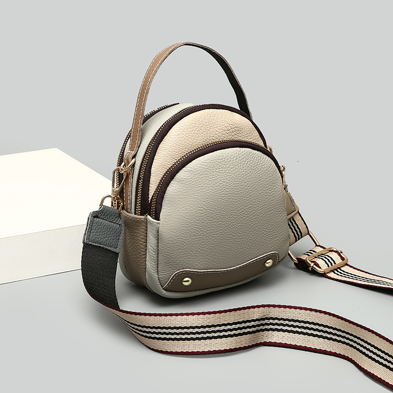 Cowhide Small Round 2025 Summer New Designer Bag Fashionable And Casual Cross Shoulder Contrasting Color Women's Handheld Broadband Bag Women