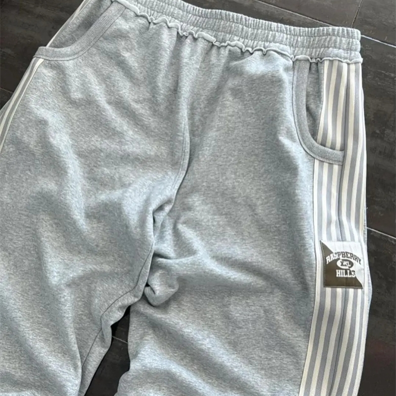 American retro contrasting color striped highwaisted sweatpants mens street loose casual simple versatile straight trousers 240911