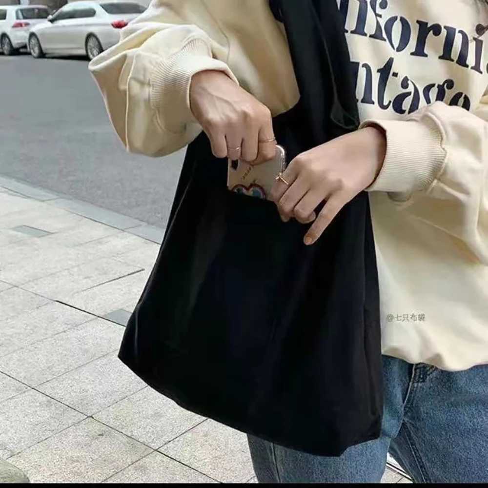 Leisure shoulder bag shopping canvas folding handbag fashionable personalized womens reusable environmentally friendly bag high-quality womens bag Z25