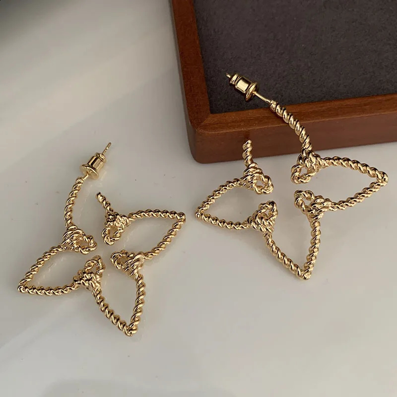 French floral earrings hollow out with temperature gradient atmospheric sub gold silver leaf earrings 240918