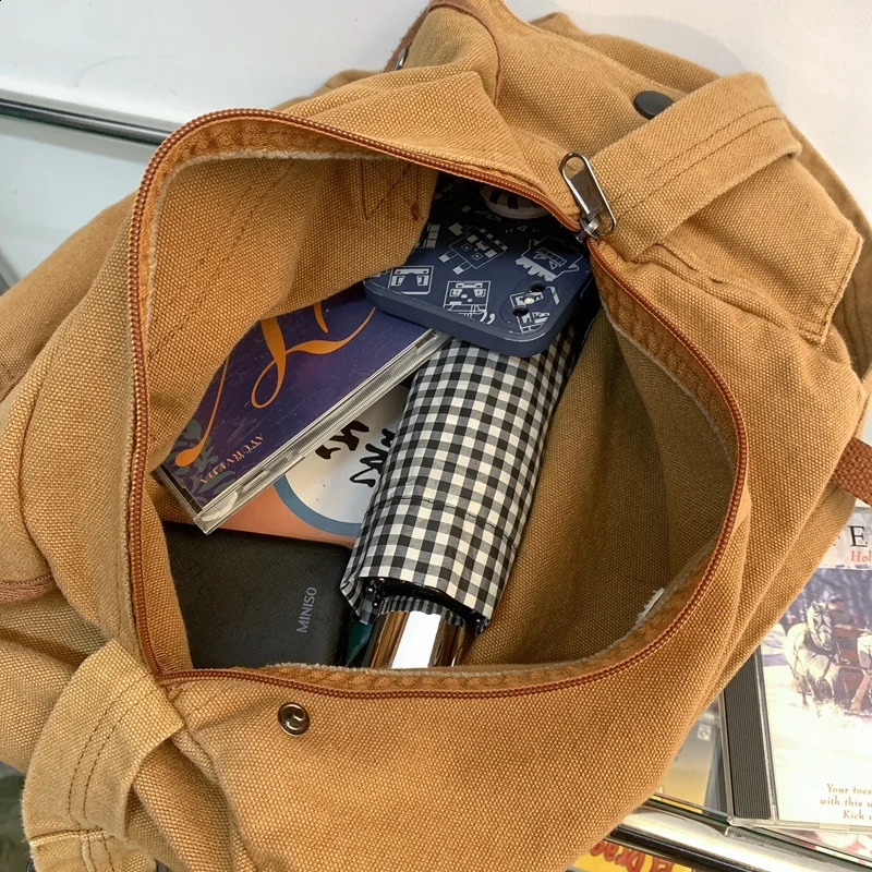 Multi pocket canvas large-sized handbag for women and students. Large street hip-hop fabric zipper messenger bag 240918