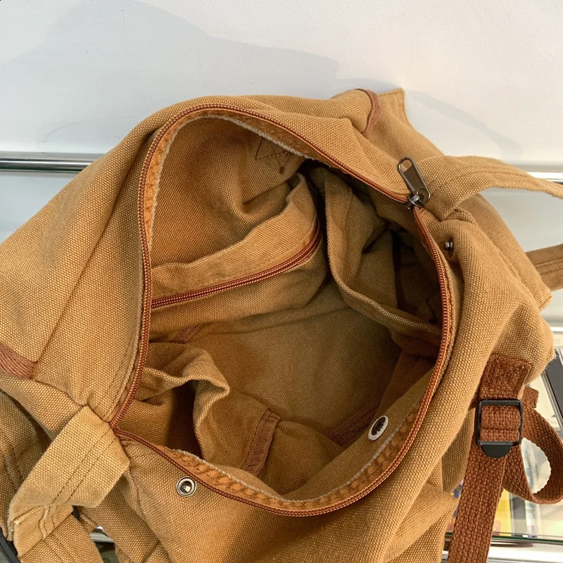 Multi pocket canvas large-sized handbag for women and students. Large street hip-hop fabric zipper messenger bag 240918