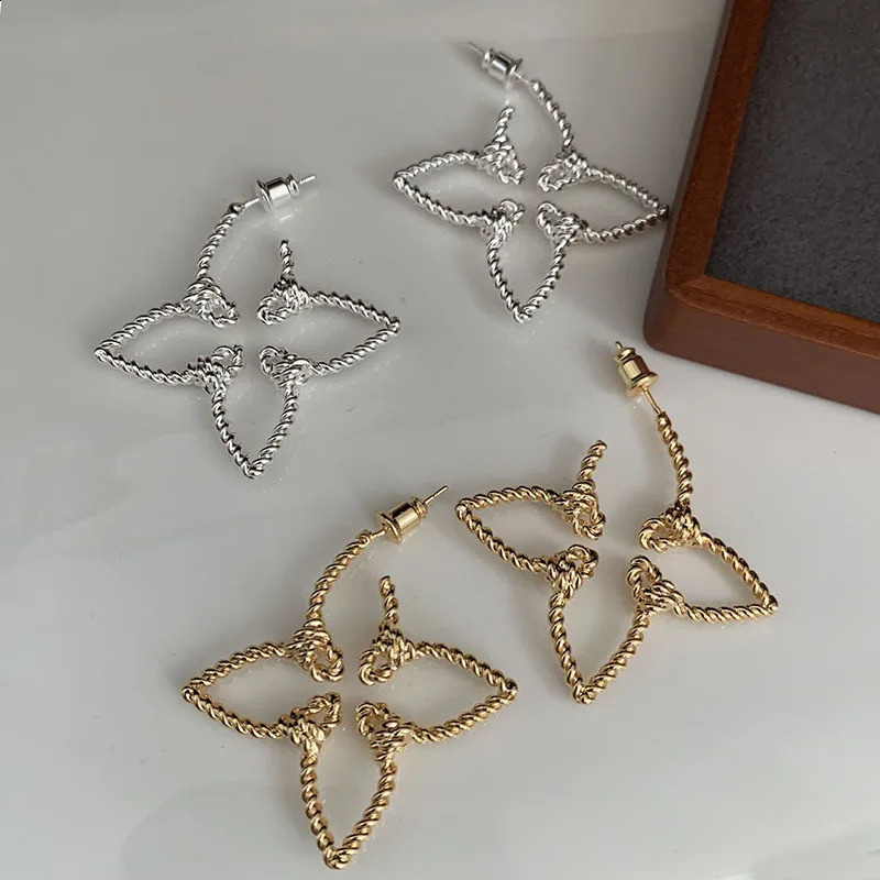 French floral earrings hollow out with temperature gradient atmospheric sub gold silver leaf earrings 240918