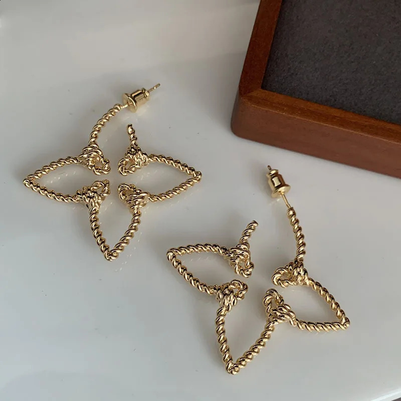French floral earrings hollow out with temperature gradient atmospheric sub gold silver leaf earrings 240918
