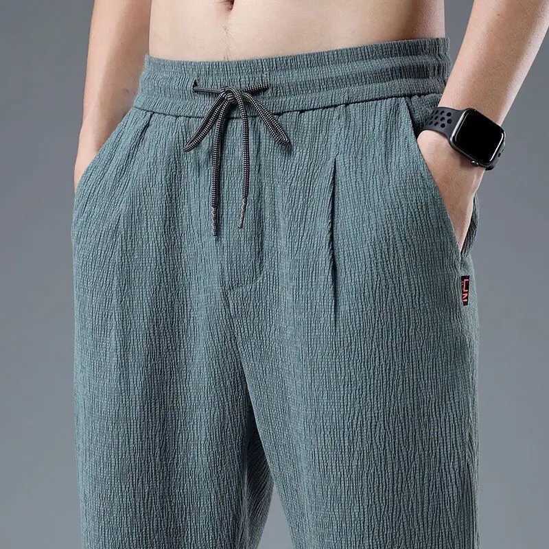 Ice Silk Linen Mens Sports Pants Casual Wide Summer Sports Pants Mens Drawstring Spring and Autumn Lightweight Halking Harem Trousers W240919