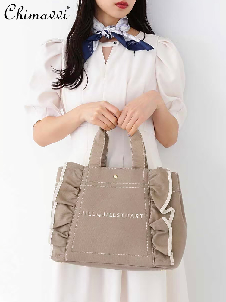 New Japanese Sweet Ruffles Canvas Large Capacity Mummy Bags Girls Women OL Portable Messenger Bag All-Matching Handbags