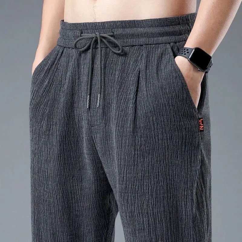 Ice Silk Linen Mens Sports Pants Casual Wide Summer Sports Pants Mens Drawstring Spring and Autumn Lightweight Halking Harem Trousers W240919
