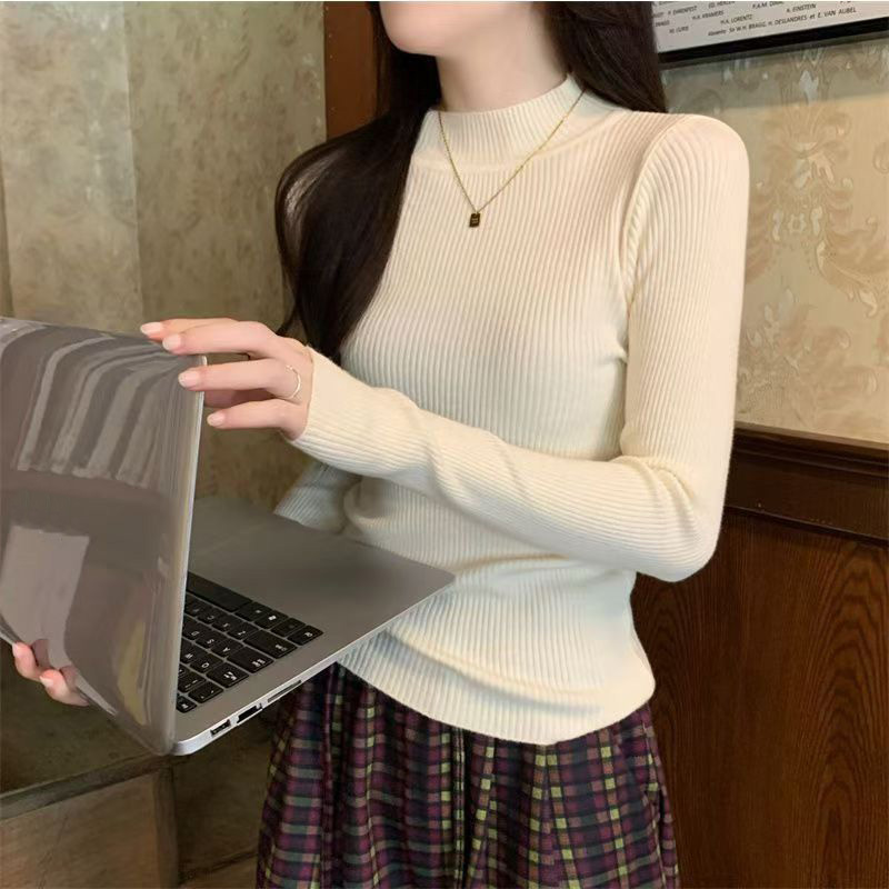 Half-high neck Joker bottoming long-sleeved knit top Korean version of solid color soft waxy sweater new female slim in winter.