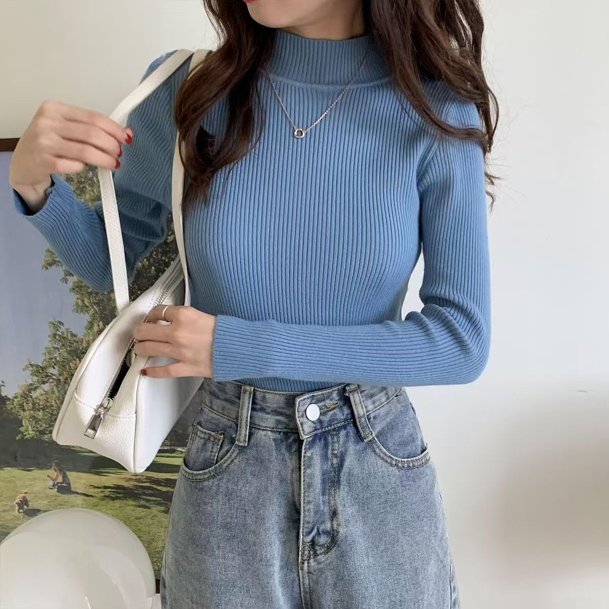Half-high neck Joker bottoming long-sleeved knit top Korean version of solid color soft waxy sweater new female slim in winter.