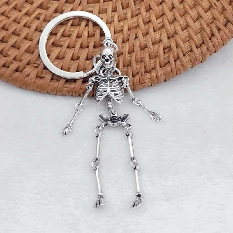 Fashionable foldable skull pendant keychain men and women antique metal alloy skull pendant keychain car keychain giftX240919