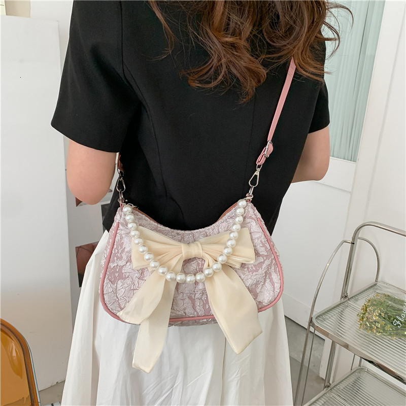 2025NEW Pearl Female Retro Designer Handbag Bow trend Crossbody Bags Fashion Canvas Women s fashion Trend Shoulder Bag Purses