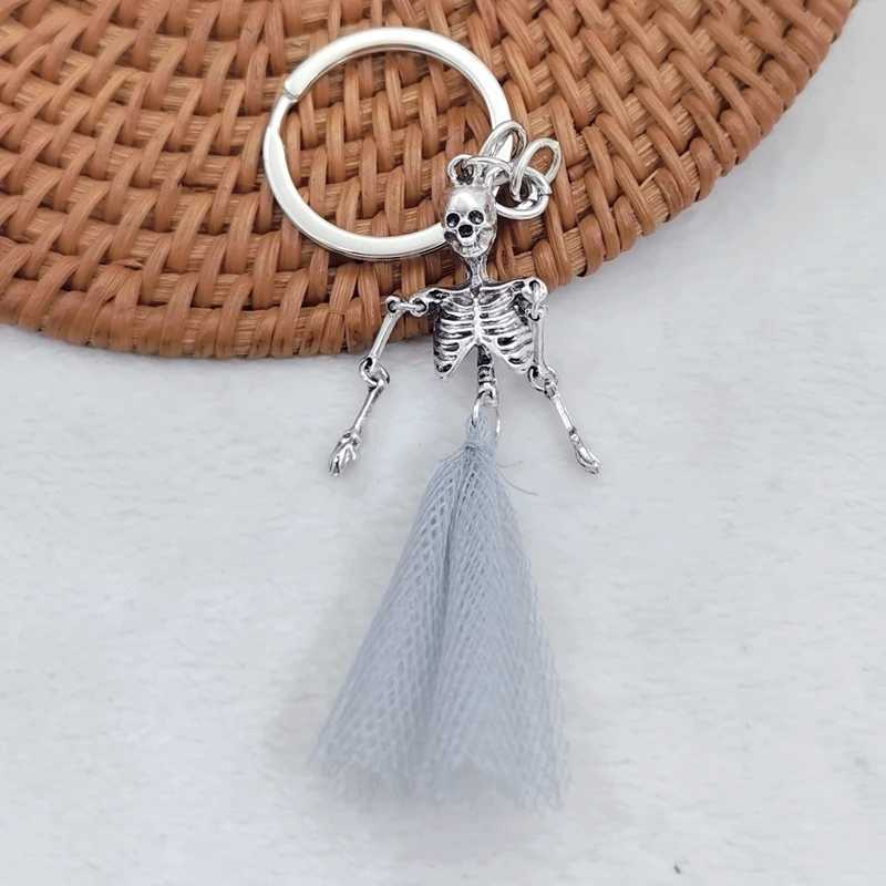 Fashionable foldable skull pendant keychain men and women antique metal alloy skull pendant keychain car keychain giftX240919