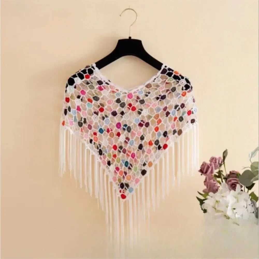 Thin crochet knitted Cape Town womens fashionable ethnic style jacket womens clothing tassel shawl raincoat womens summer bag jacket W240921