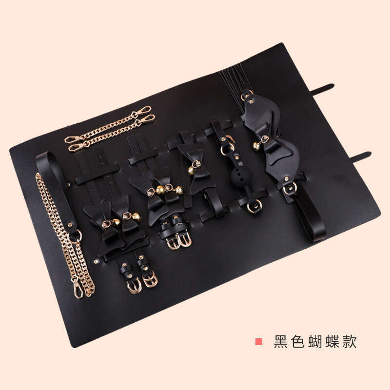 SM prop set with storage bag, bow, bell, collar, fun hand and foot handcuffs, silicone mouth ball, tassel, leather whip