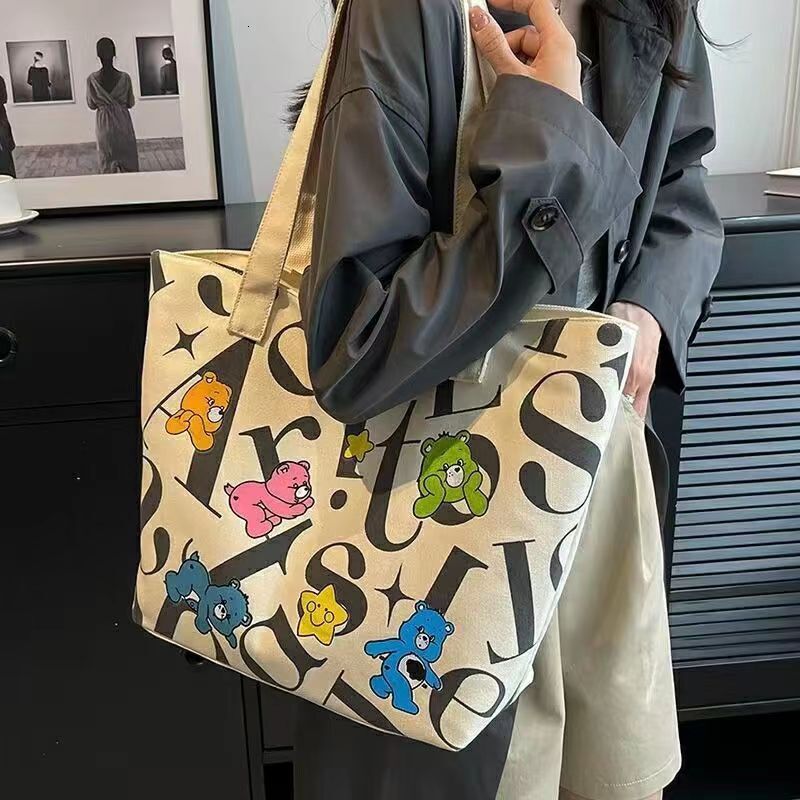 2024 Designer Women's Bag Canvas Women's Large Capacity Handbag Commuter Multi functional Printed Mother's Handbag, Free Shipping