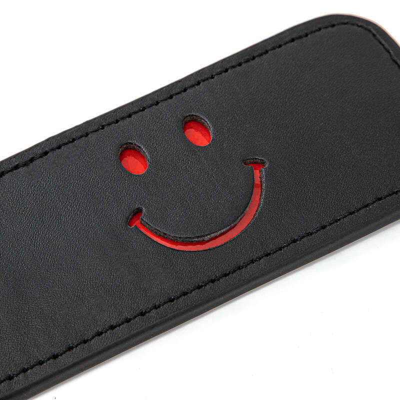 Alternative sex toys SM props cross-border hot selling black smiling face leather racket female slave training SP props sex racket