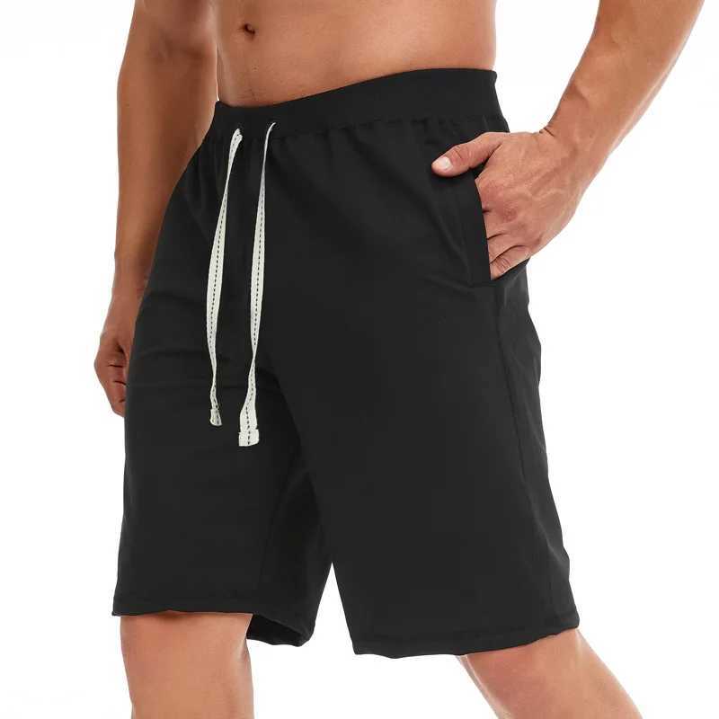 2024 Summer Mens casual pants fashion loose plus size cargo shorts Mens sports quarter pantsX240921