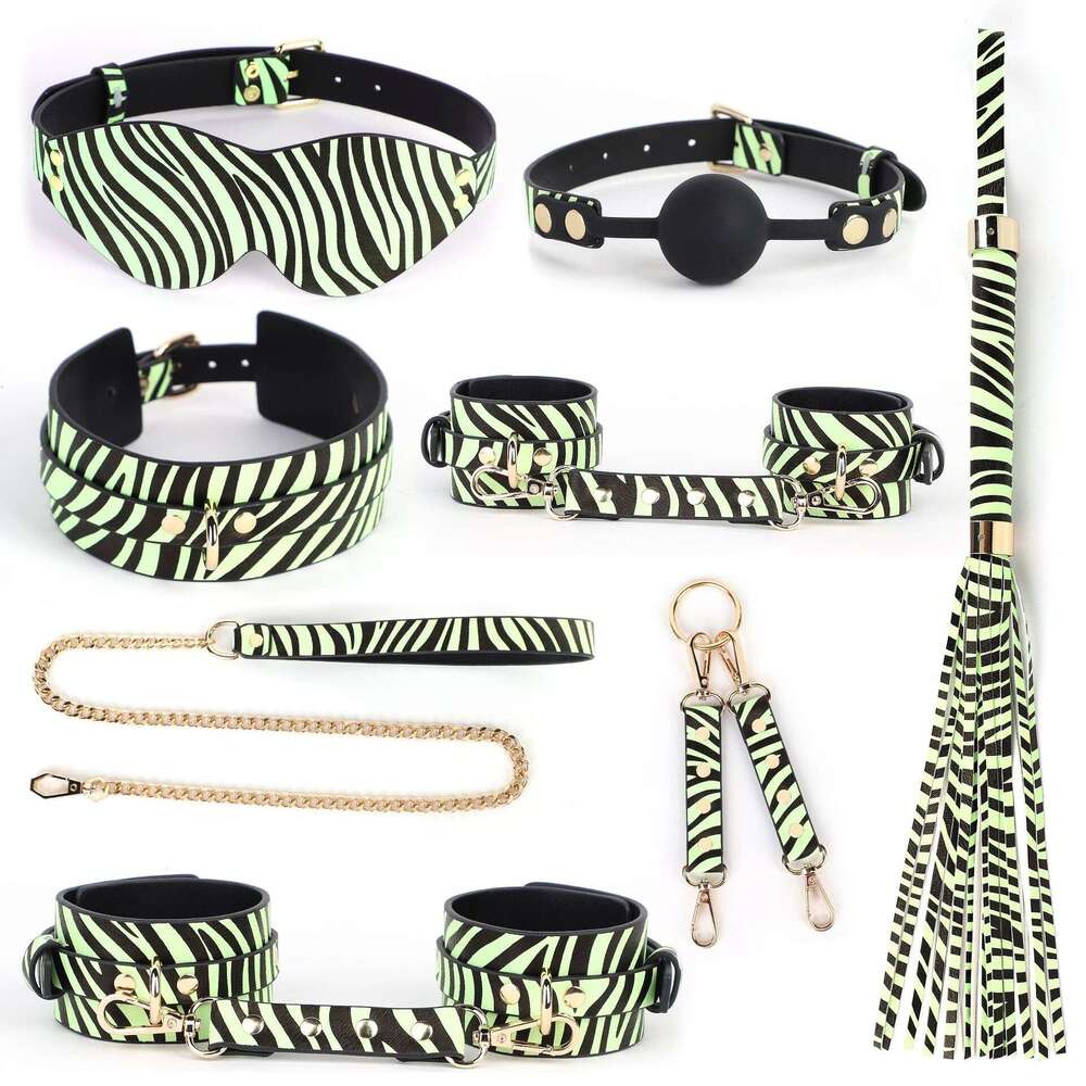 Cross border exclusive SM sex props luminous seven piece set zebra print sex handcuffs leopard print leather whips adult products