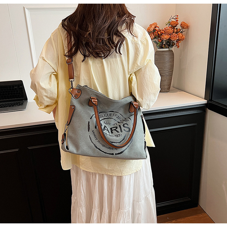2024 Fashion Handheld Large Capacity Summer New Casual Multi functional Canvas Shoulder Women's Bag Free Shipping