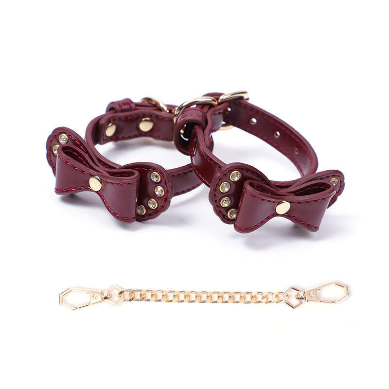 High end SM props, torture equipment, PU bound handcuffs, retro diamond studded bow, erotic handcuffs, alternative adult products