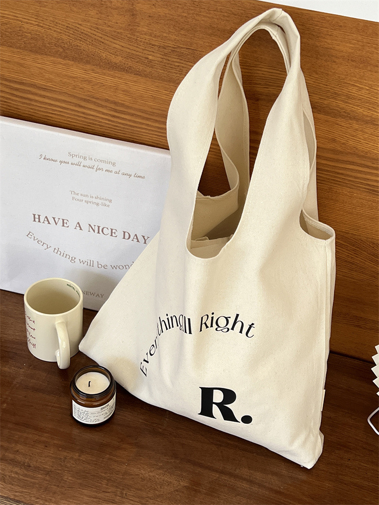 2024 New Designer Bag Canvas Commuter Multi functional Unique British Handbag Single Shoulder Women's Winter and Summer Collection Free Shipping