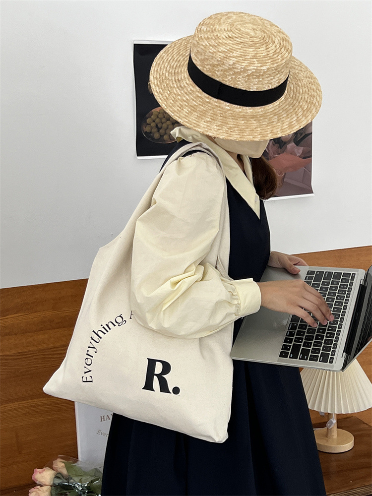 2024 New Designer Bag Canvas Commuter Multi functional Unique British Handbag Single Shoulder Women's Winter and Summer Collection Free Shipping