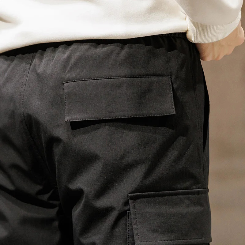 MenS Winter Fashion Versatile Multi Pocket Sports Leisure Down Pants Solid Color Thickened Warm 90 Duck Down Work Trousers 240913