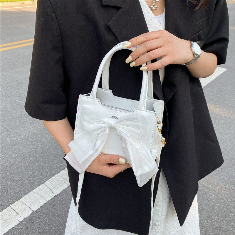 Cute Fairy Knot Handbag for Women New 2023 Summer Chic Versatile Shoulder Crossbody Bag with Soft Surface Zipper Closure