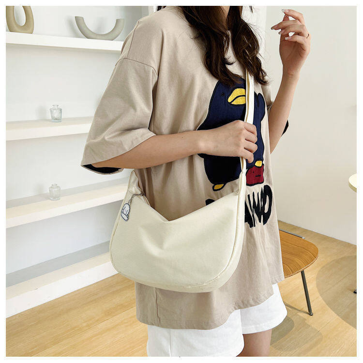 Korean Version All-Match Crossbody Bag Student ins Japanese Shoulder Haruku Simple Waffle Casual Art Messenger Solid Color Dumpg bag