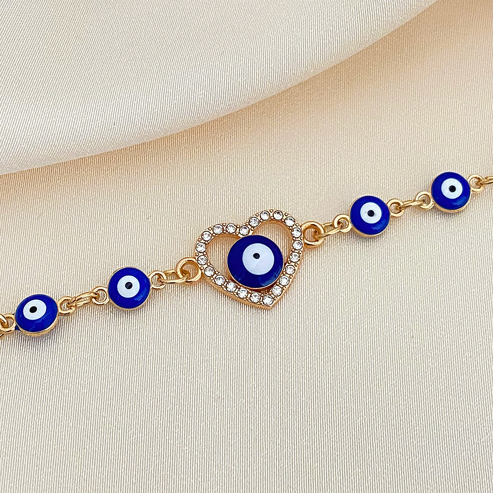 Beaded bracelet European and American Fashion Handpiece Devil's Eye Hollow Diamond Heart Drip Oil Eye Bracelet